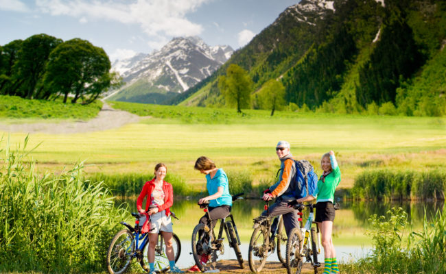 Cyclists biking outdoors